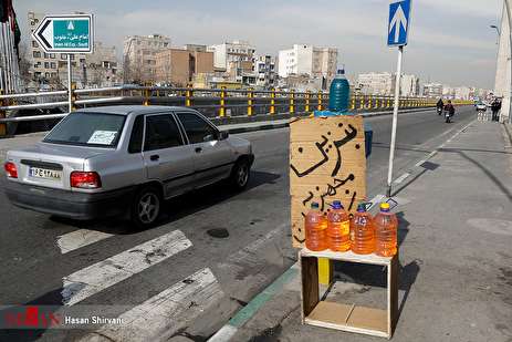 گزارش تصویری: دستفروشی بنزین در خیابان‌های تهران!