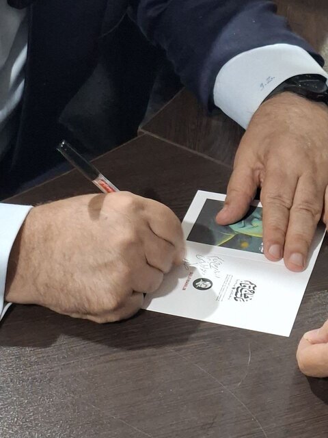 حضور ظریف در نمایشگاه کتاب +عکس