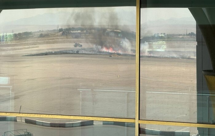 دود ناشی از سوزاندن علفهای خشک؛ انفجار در فرودگاه هاشمینژاد مشهد کذب است دود ناشی از سوزاندن علفهای خشک؛ انفجار در فرودگاه هاشمینژاد مشهد کذب است